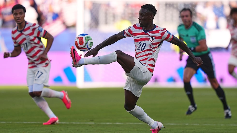 United States' Folarin Balogun (20) kicks during the World Cup round of 32 soccer match...