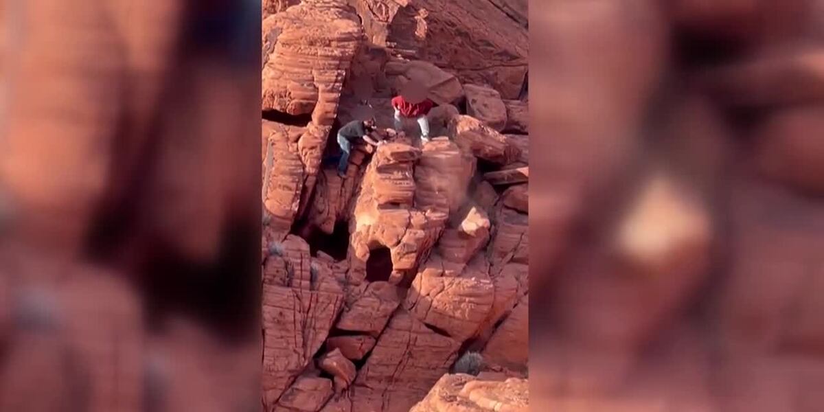 Three Men Breaking Rocks Men caught on camera destroying ancient rock formations at national park