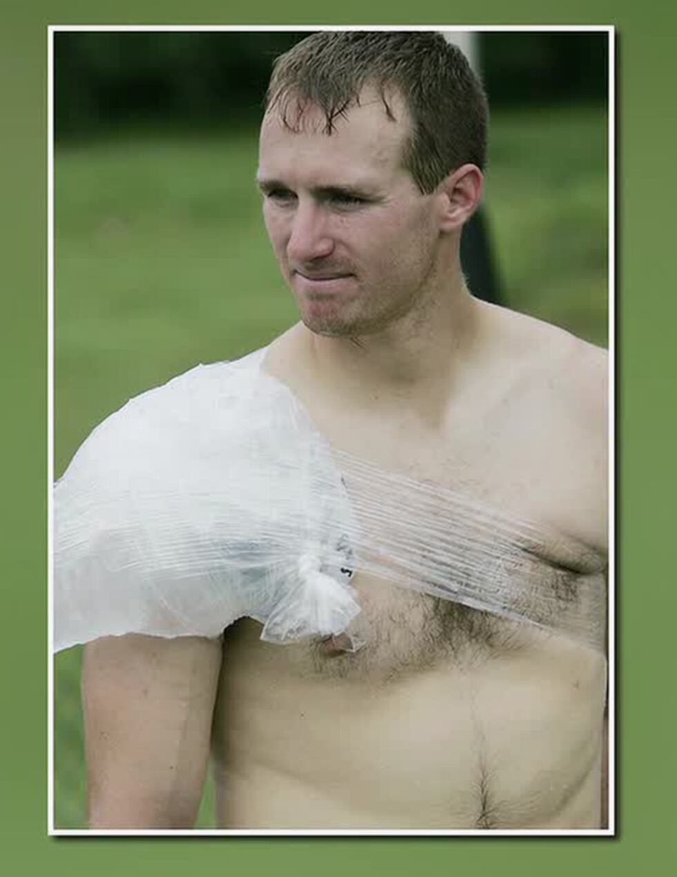 Drew Brees has his injured throwing shoulder iced during his rehabilitation from the injury...