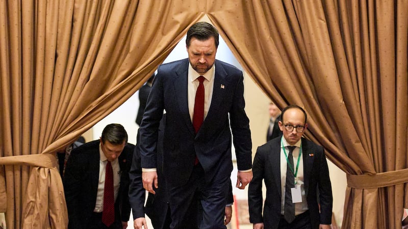 Vice President JD Vance, center, walks up a flight of stairs to meet with Pakistan's Prime...