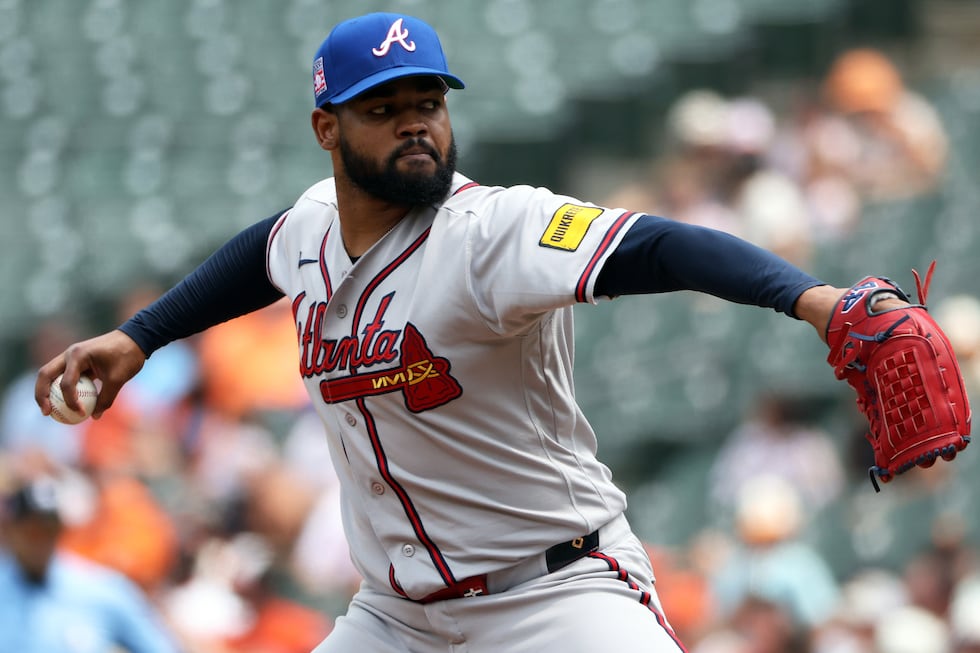 Atlanta Braves pitcher Reynaldo Lopez throws during the first inning of a baseball game...