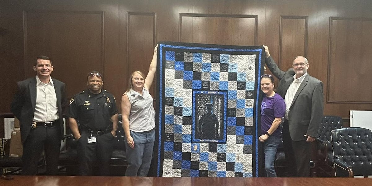 Mobile Police officer injured by gunfire receives special gift