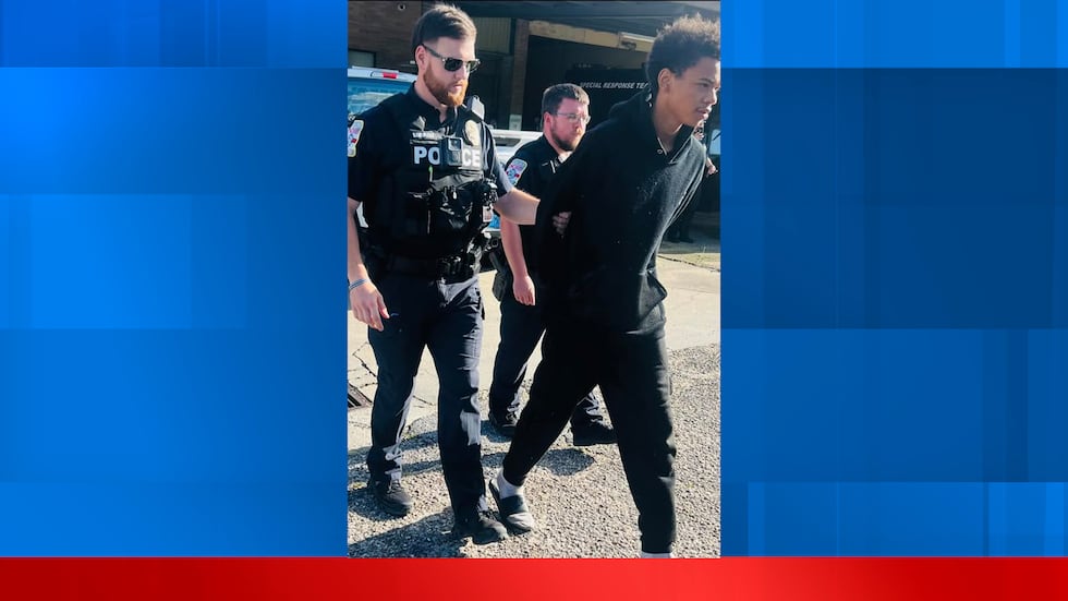 Ronal Isaac is taken into custody after Atmore police say he and a juvenile broke into a...