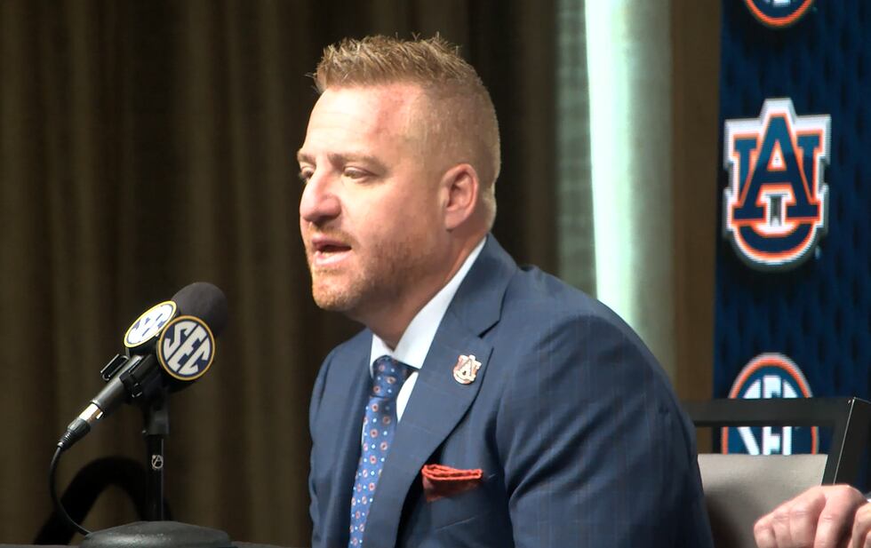 Auburn head coach Alex Golesh speaks at SEC Media Days.